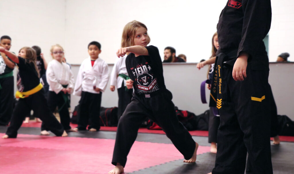 A girl learning at an Indianapolis martial arts school